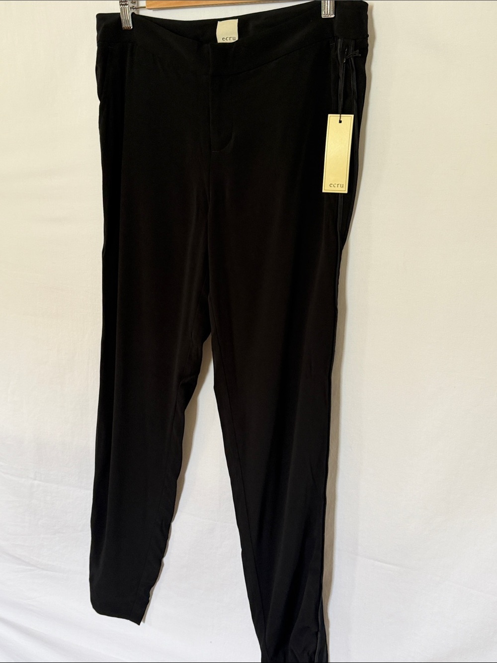 ecru Women’s Black Slim Dress Pants with tone on tone seam piping.